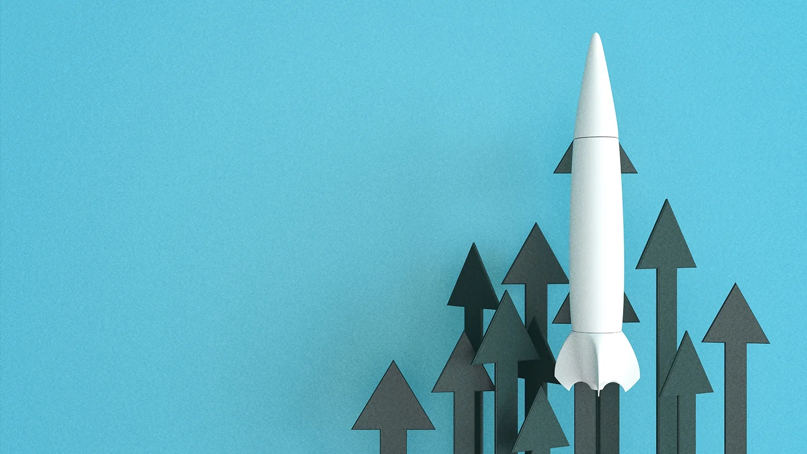 A rocket ship facing upward with upward facing arrows, representing the evolution of brand marketing