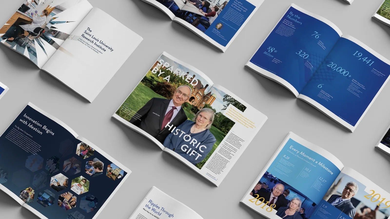 Open magazine spreads showcasing design for Saint Louis University