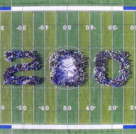 SLUH football field with 200 shaped out of students