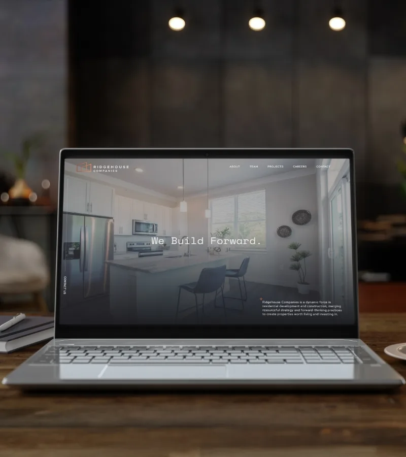 laptop open to the ridgehouse capital homepage